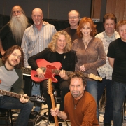 Pictured in the photo with Carole and Reba are: L-R top row: Leland Sklar (bass), Russ Kunkel (drums), Dean Parks (guitar), J.D. Maness (steel). Matt Rollings (piano).  L-R bottom row: Tom Bukovac (guitar), Tony Brown (producer). Photo by Glenn Sweitzer