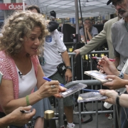 Signing albums & CD's.Photo by Elissa Kline