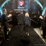 Carole King is escorted to the stage by her son Levi Larkey. Photo by Elissa Kline